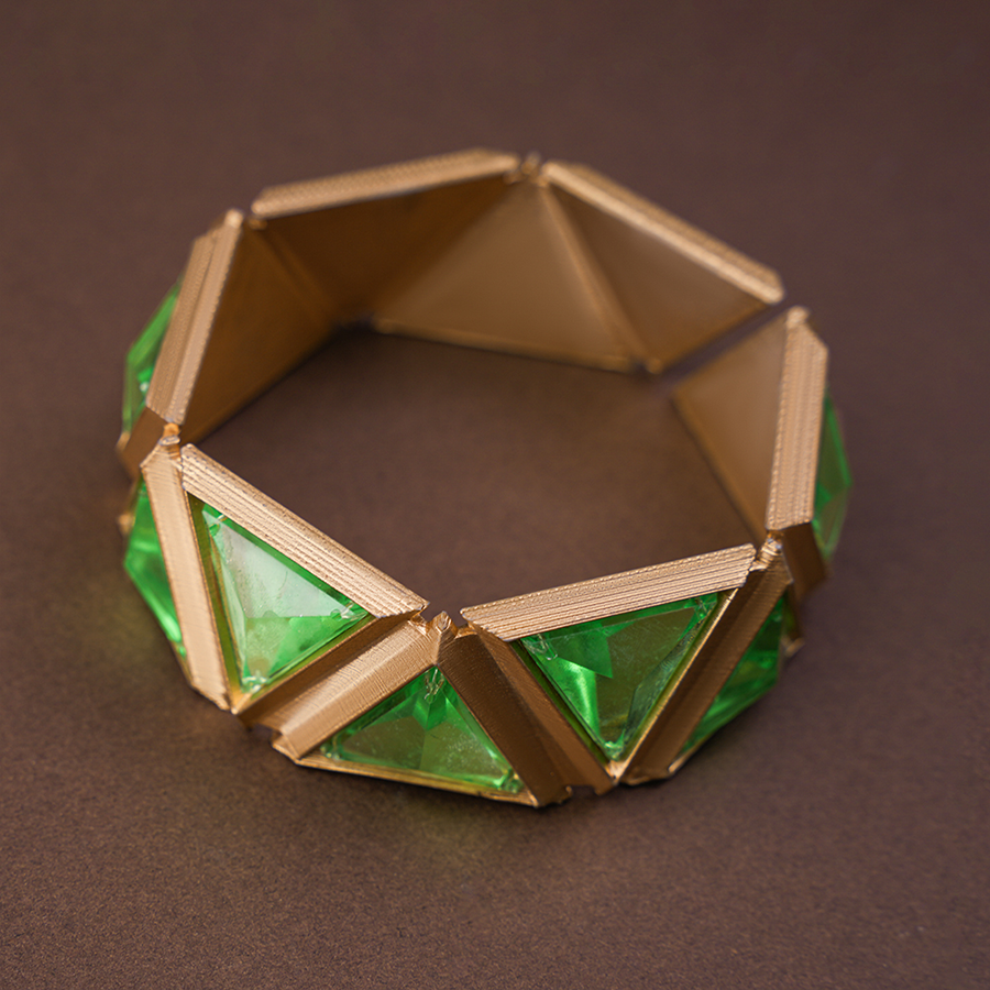 Genshin Impact Nefer Cosplay Costume prop bracelet, mainly golden and green colors.