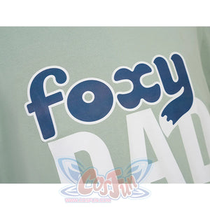 Nick cosplay costume t-shirt print detail featuring Foxy Dad logo in blue and white on green fabric