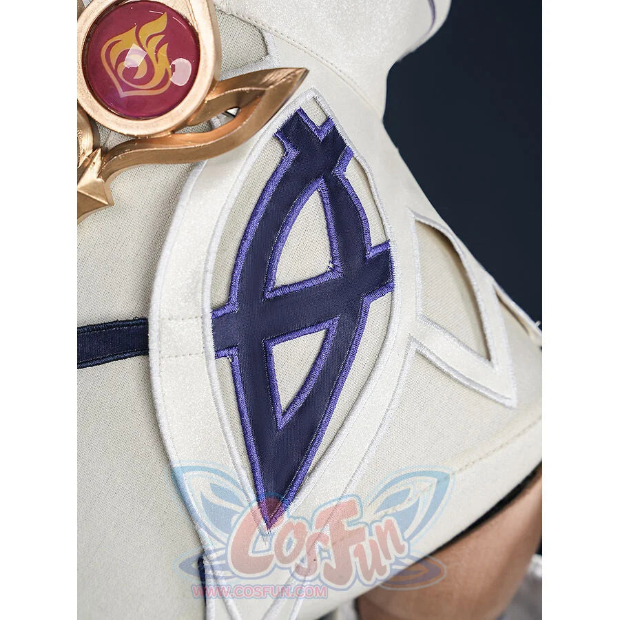 Nicole cosplay armor chest close-up showing dark blue embroidered diamond arrow emblem on white fabric with gold pendant above.