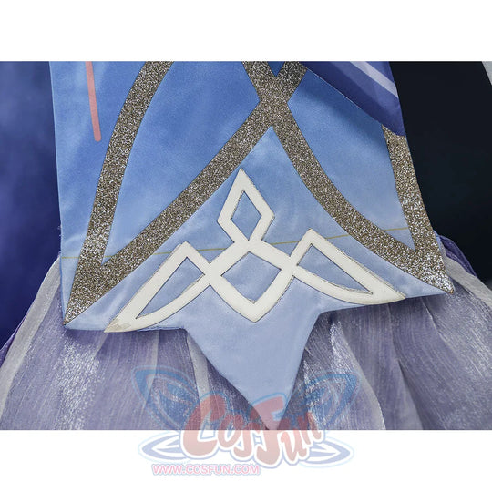 Nicole cosplay blue skirt panel close-up with white diamond embroidery pattern and silver glitter trim on layered purple tulle.