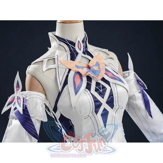 Nicole cosplay costume chest close-up on mannequin, white armored bodice with butterfly brooch and geometric blue diamond patterns.