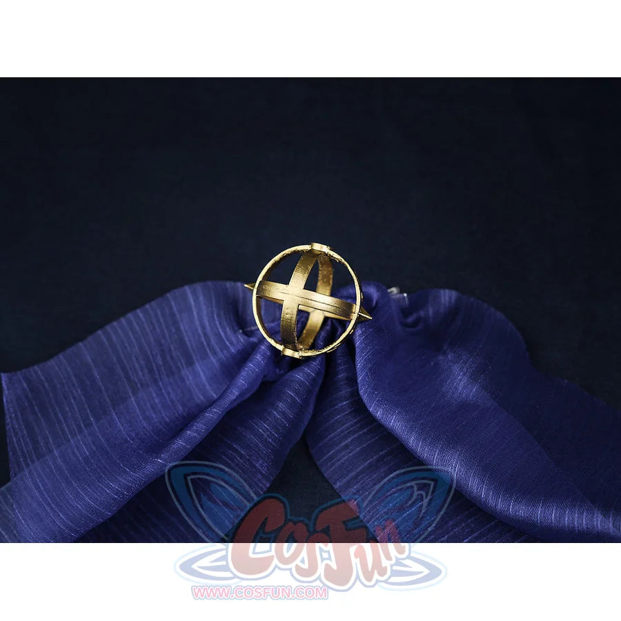 Nicole cosplay gold circular brooch with cross design, displayed on blue satin fabric, an included accessory for the costume.