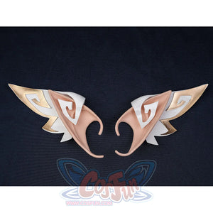 Nicole cosplay wing-shaped ear accessories, a matching pair with gold and rose gold metallic finish on dark background.