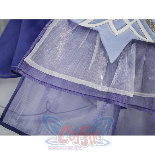 Nicole cosplay skirt close-up showing layered purple tulle mesh overlay with white piping trim and blue satin panel above.