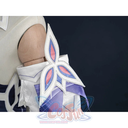 Nicole cosplay costume star-shaped shoulder accessory close-up, white fabric with pink petal details and blue base panel.