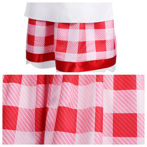 Detailed close - up of the checkered pant pattern of the Patissiere Peach costume, with red trim.