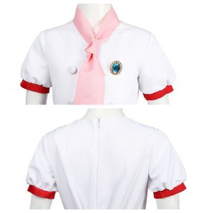 Close - up of the top section of the Patissiere Peach costume, highlighting the pink scarf and decorative badge.