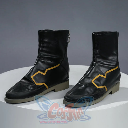 Rerir cosplay boots featuring gold zigzag toe accents, angled front view of both black boots on a white stand.