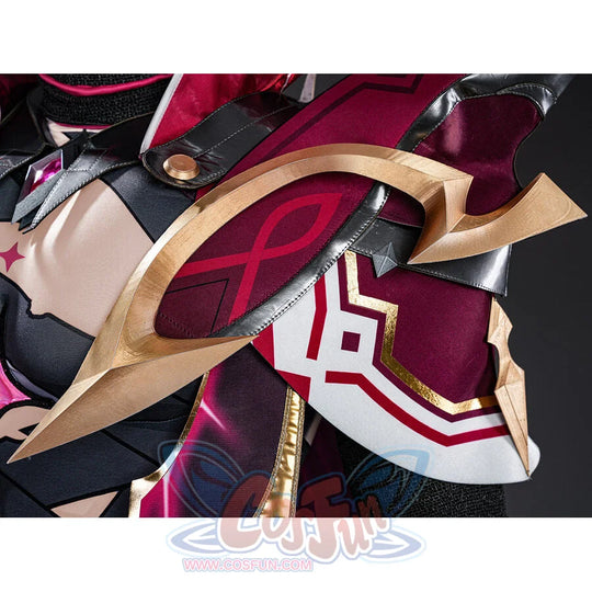 Rerir cosplay gold arch chest armor closeup with red fabric panels and white armor detail