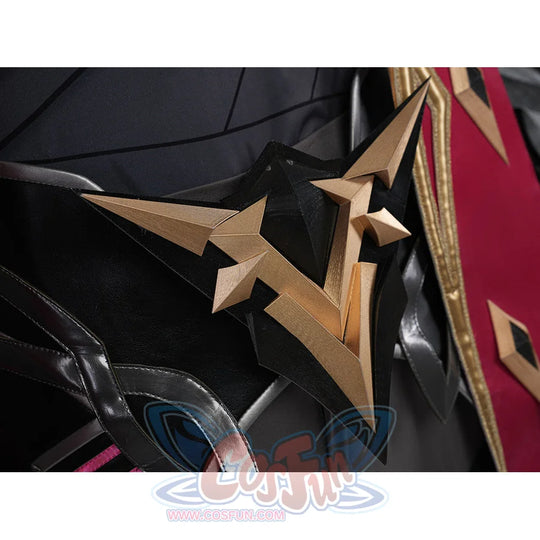 Rerir cosplay gold star emblem on black coat closeup with red cape and dark armor in background