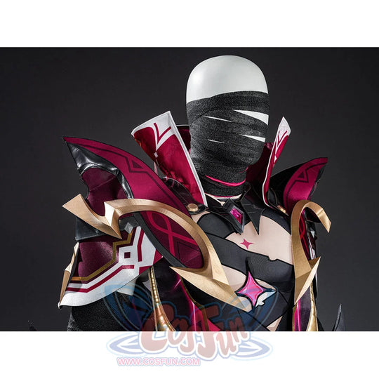 Rerir cosplay upper body front view with gold armor, dark bodysuit, pink star gem, and face wrap