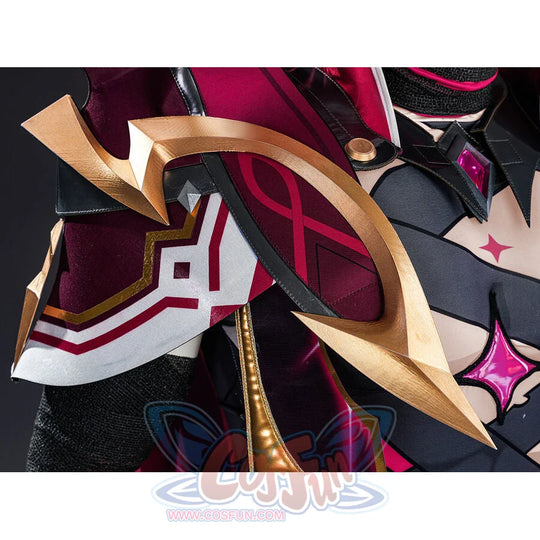 Rerir cosplay shoulder armor detail view highlighting gold frame, red fabric, and pink star gem accent when worn