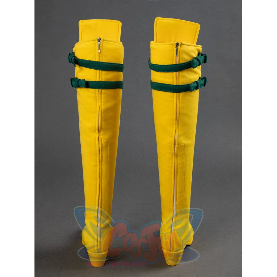 Rear view of yellow Rogue cosplay boots showing back zippers and green buckle straps on gray background