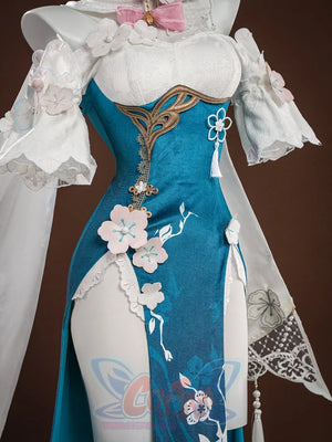 Ruan Mei cosplay costume angled view showing teal dress with gold trim, white sleeves, pink flowers, and lace hem.