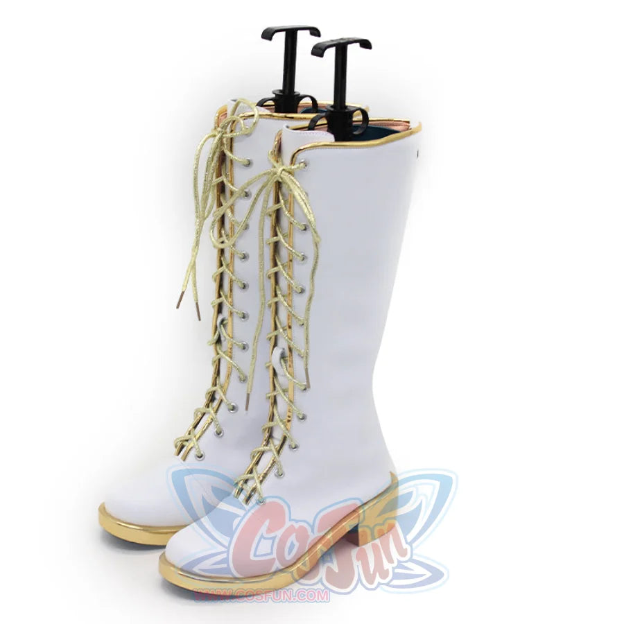 A pair of white Rumi cosplay boots with gold - accented laces and chunky gold heels, presented from the front to showcase the tall, lace - up design.