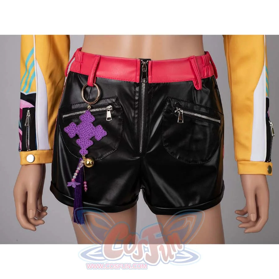 Close - up of the front of Rumi’s black cosplay shorts with a red waistband, showcasing a purple tassel accessory and zippers.