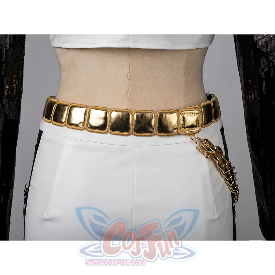 Features the multi-layered gold waist chains on shorts, showcasing bold and unique lower-body decor, gold belt with matching chain.