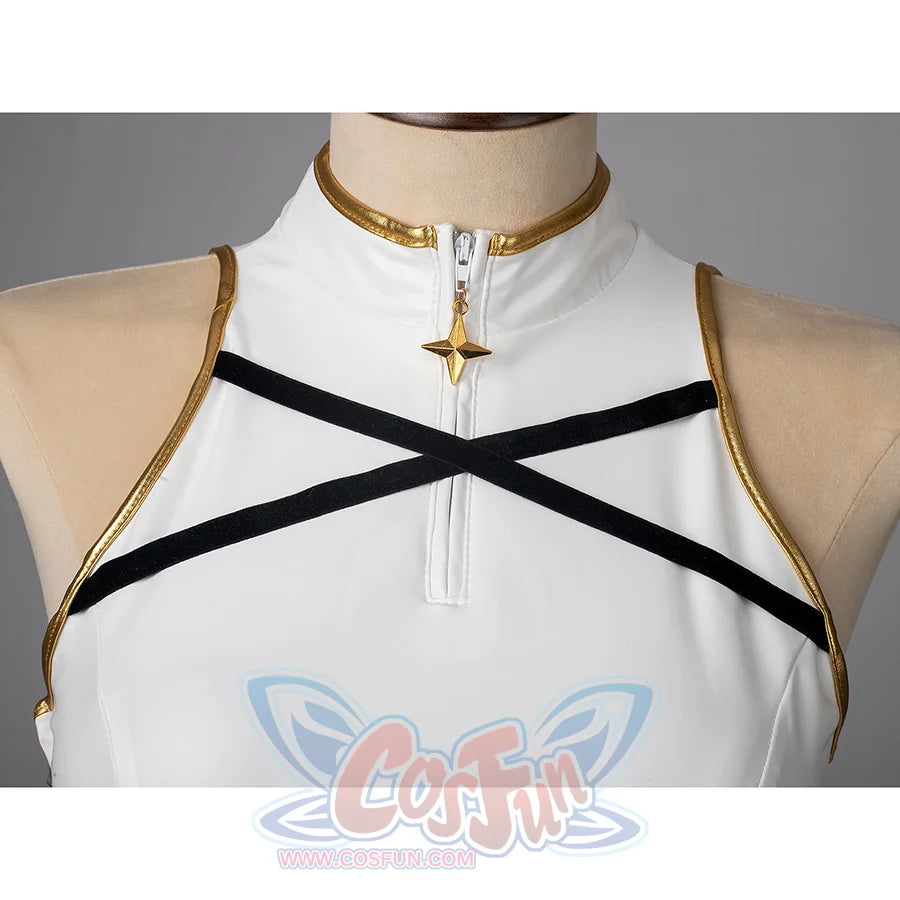 The top features gold decorative details, a high collar, a golden star zipper at the front and two black crisscross straps at the chest area.