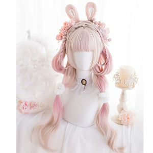 Women's long pink ombre curly Lolita cosplay wig styled with bunny accessories