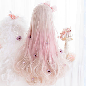 Back view of women's long pink ombre curly synthetic wig on mannequin, 60cm length