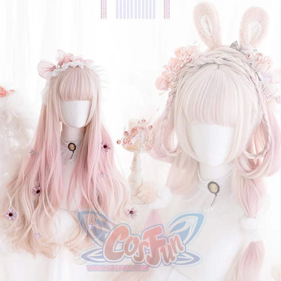 Close-up of long pink ombre curly wig with voluminous ringlet curls