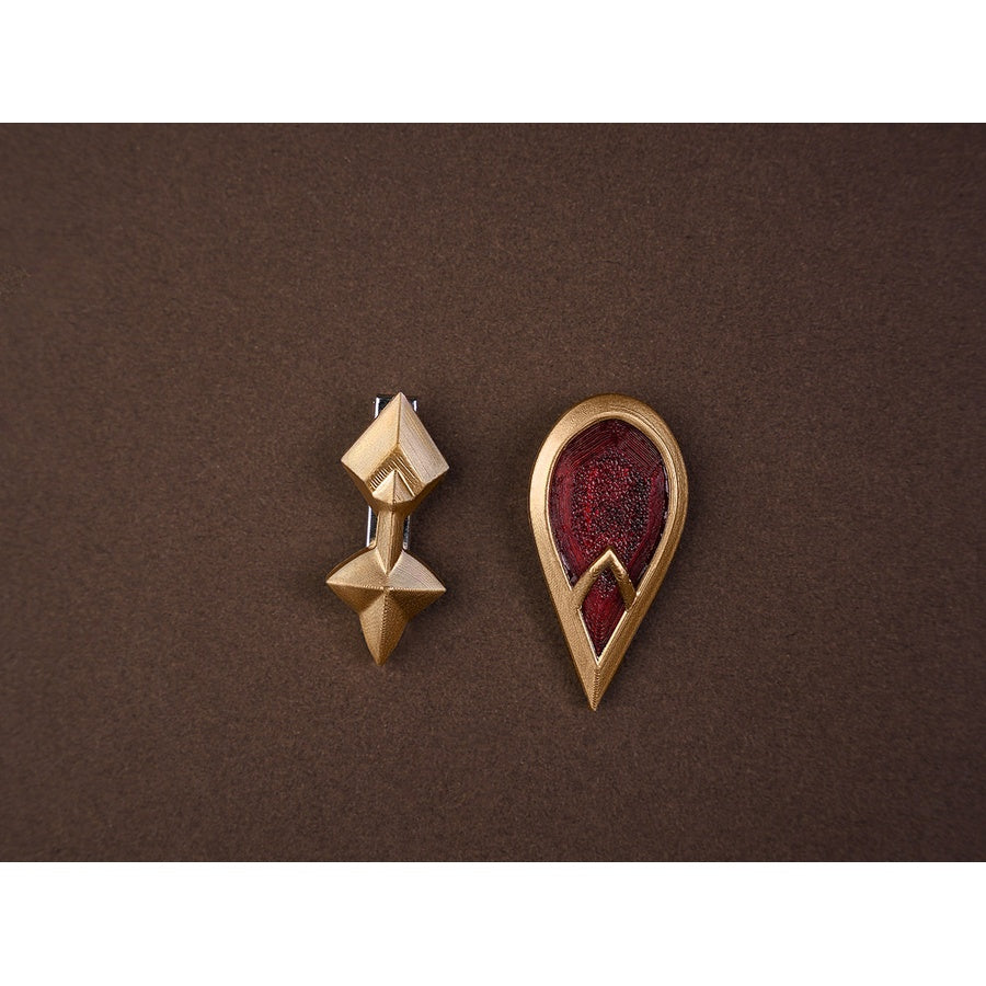 Sandrone cosplay costume collar accessories including a gold diamond-shaped pin and red teardrop gem brooch with gold frame