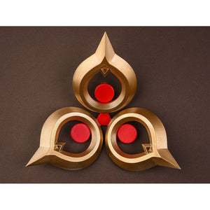 Sandrone cosplay costume waist ornament accessory laid flat, gold piece with three red gem circles in teardrop frames