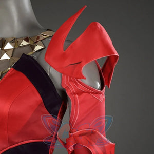 Close-up of Scarlet Witch cosplay costume’s shoulder, highlighting the red, angular shoulder armor and gold-studded neckline.