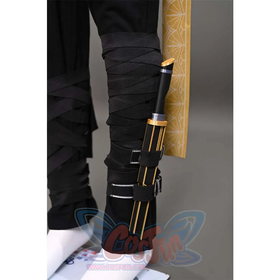 A close-up of the leg sheath on Sciel's cosplay costume, showcasing the detailed design and the combination of black and gold elements.