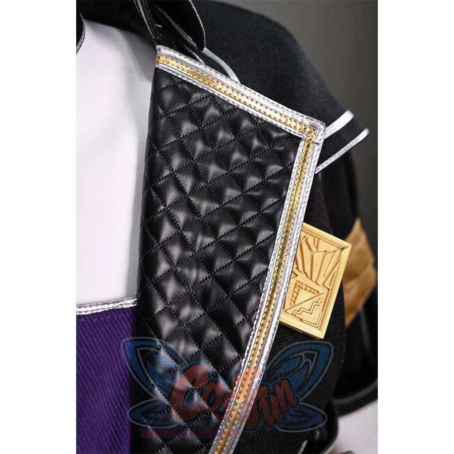 A close-up of the shoulder pattern on Sciel's cosplay costume, displaying the intricate gold design on the black fabric.