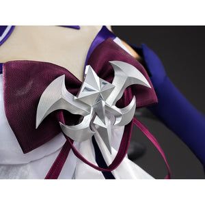 Seele cosplay silver star chest ornament macro view with dark red ribbon bow on white fabric