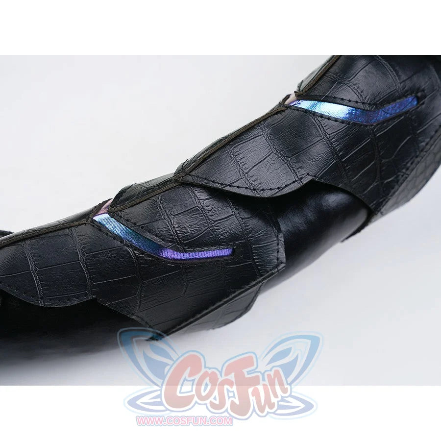 Silver Wolf cosplay tail close-up showing black textured surface with glowing blue accent details