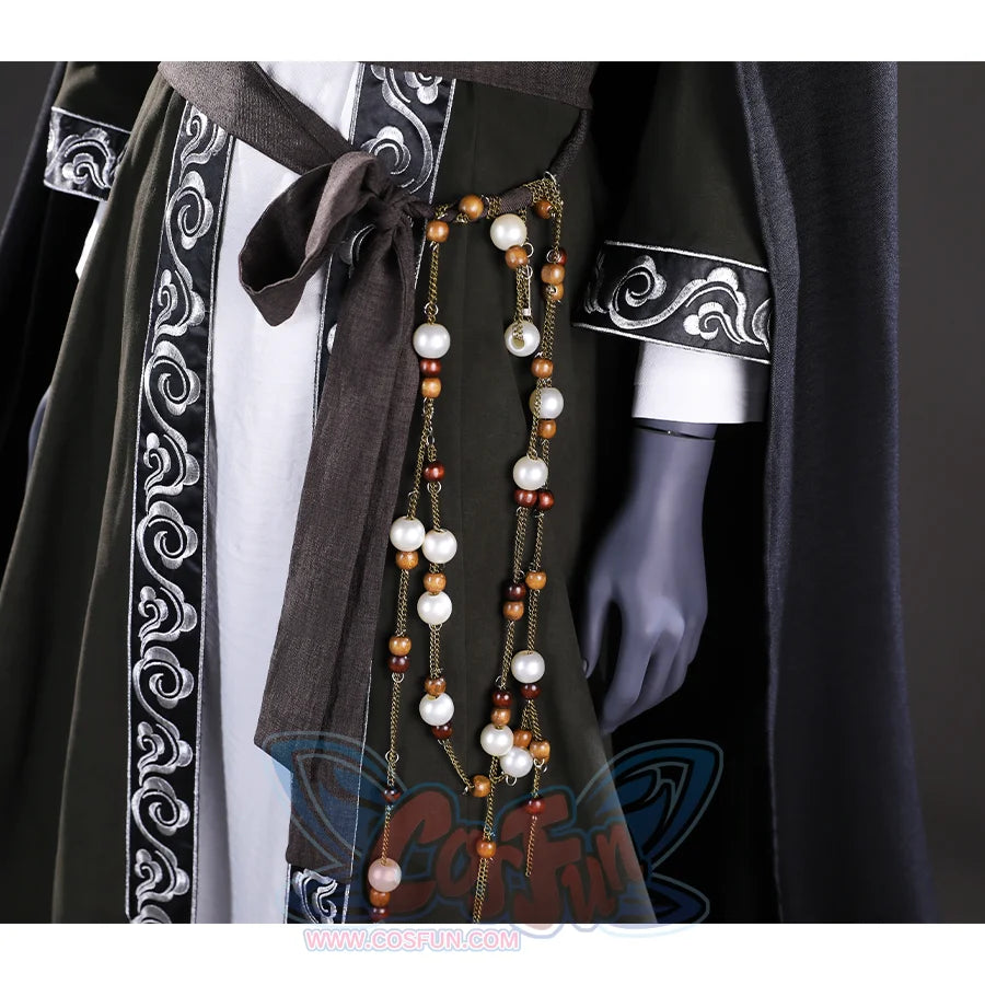 This close-up focuses on the bead detail hanging from the belt of the Sister Friede cosplay costume, featuring a combination of white and brown beads.