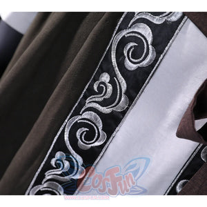 A close-up of the sleeve detail on the Sister Friede cosplay costume, showing the intricate silver embroidery on the dark green fabric.