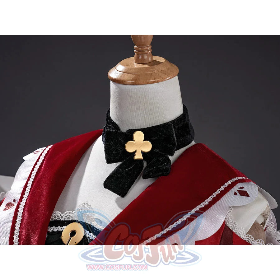 Sparxie cosplay costume accessory detail showing gold clover brooch and black velvet bow on the collar area