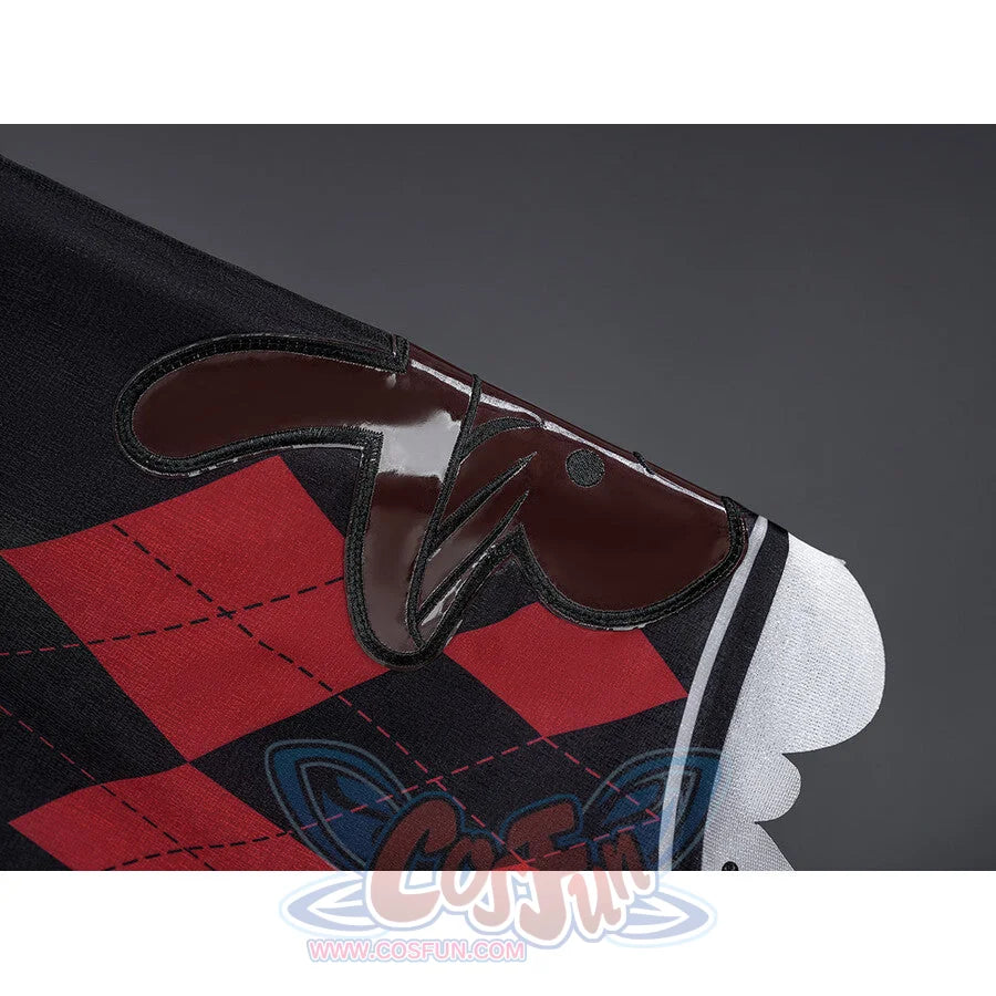 Sparxie cosplay costume headpiece close-up with black rabbit ear top hat on red and black argyle diamond patterned cape