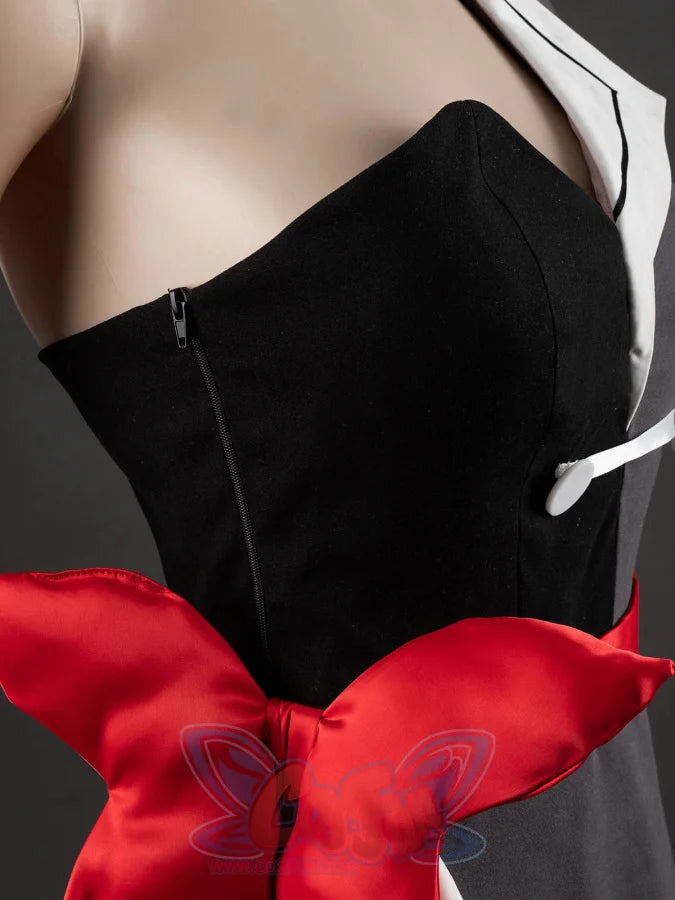 Starfire cosplay costume close-up of black bodice with side zipper, white lapel lining, and large red satin bow