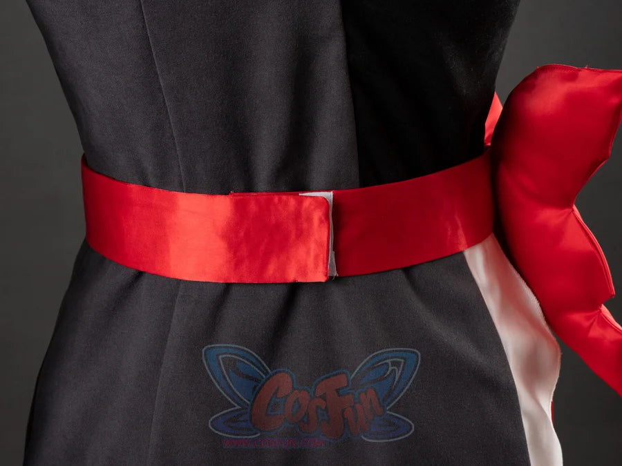 Starfire cosplay costume front waist close-up with wide red satin belt and large red satin bow on the side