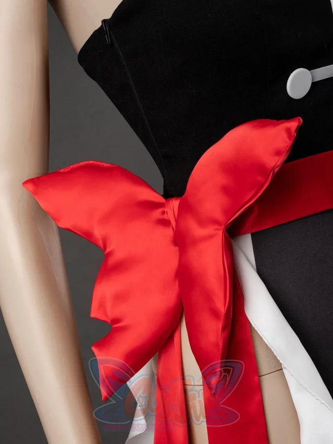 Starfire cosplay costume close-up of large red satin bow tied at the waist with white ruffle panels below