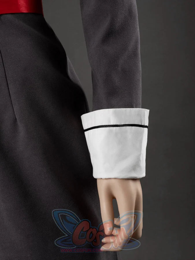 Starfire cosplay costume sleeve detail showing gray jacket with white cuff trimmed with black piping at the wrist