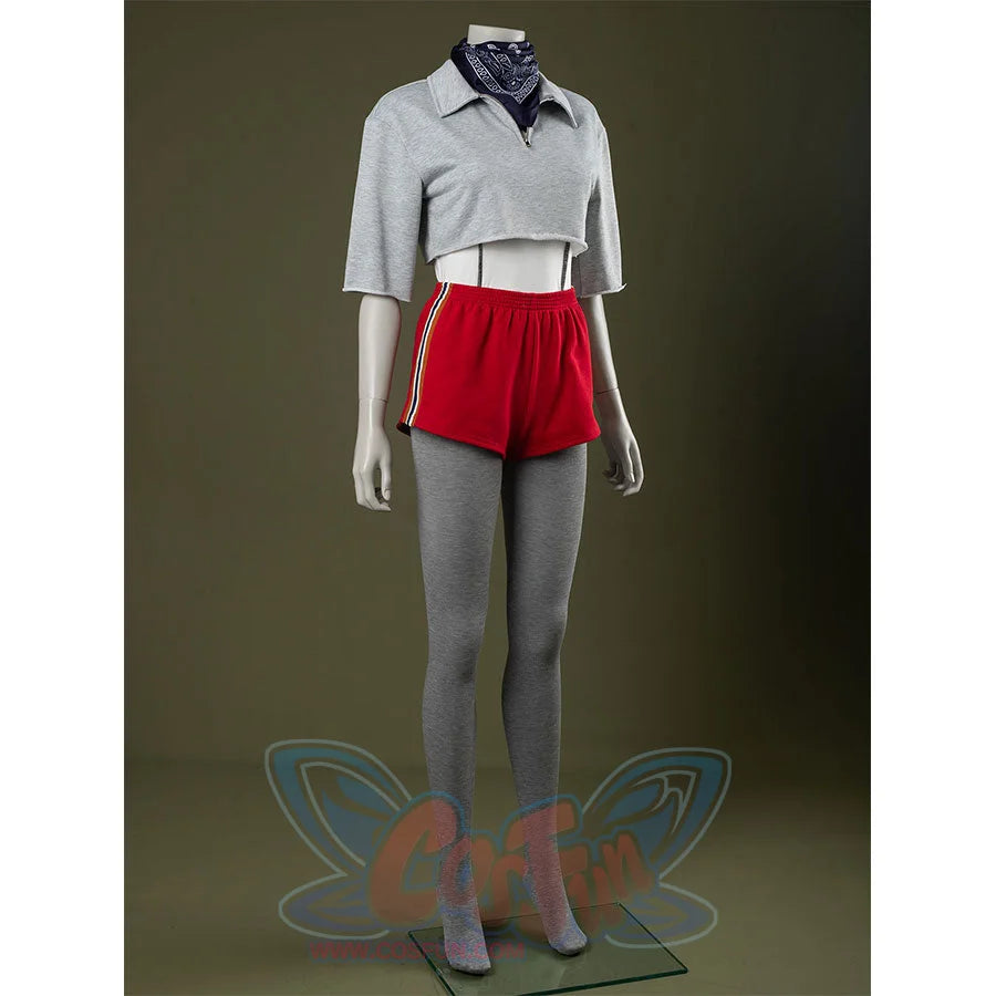 Left side view: Eleven Cosplay Costume with gray cropped collared top, red side-striped shorts, gray leggings, and dark blue paisley headscarf.