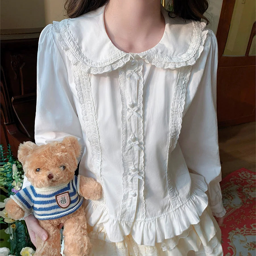 White Lolita puff sleeve blouse with lace Peter Pan collar and heart buttons with bow decoration