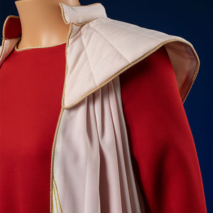 Princess Leia cosplay costume detail featuring red fabric and white cloak with golden trim accents