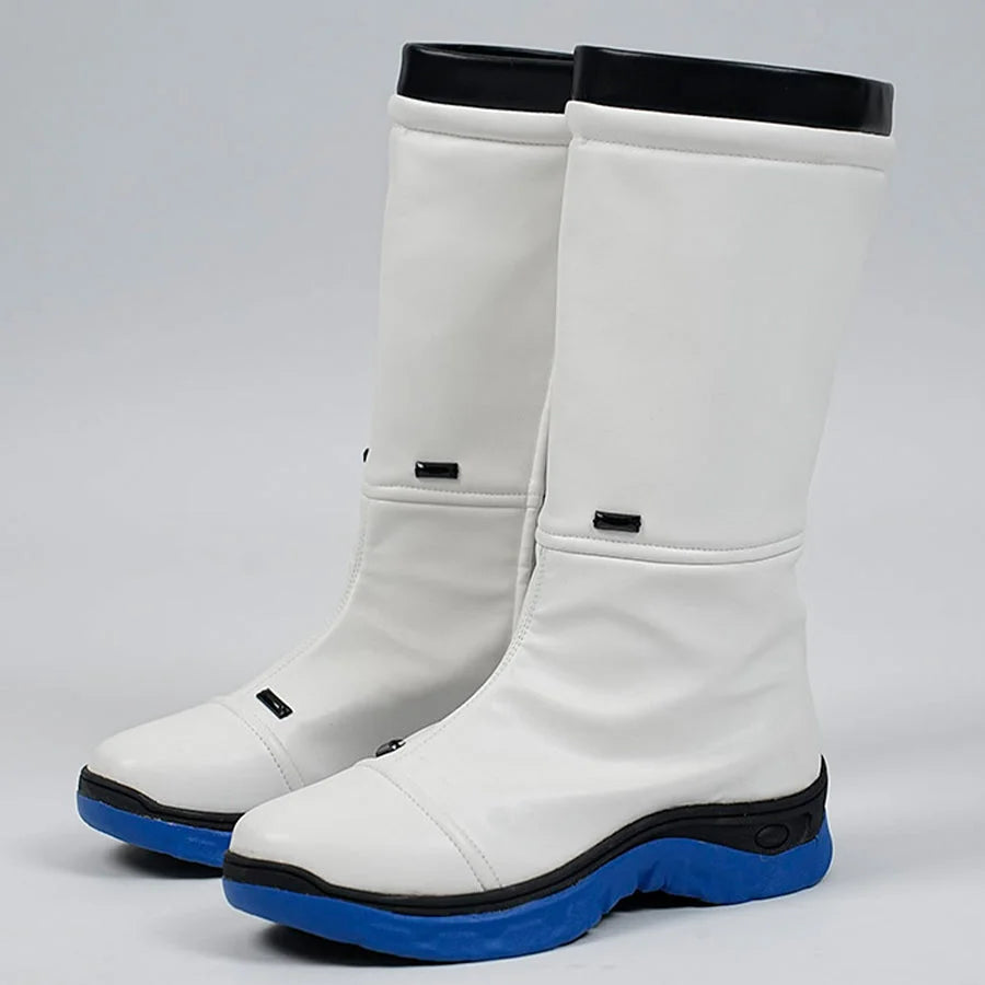 White boots with blue soles on a gray background