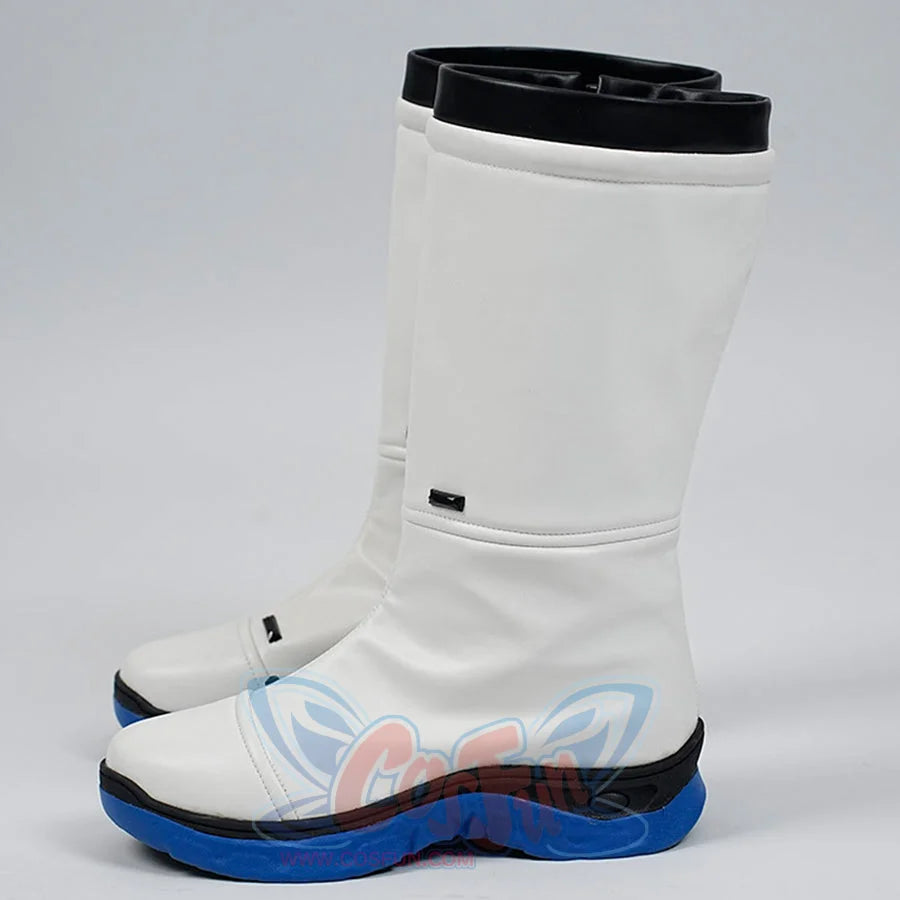 White boots with blue soles on a gray background