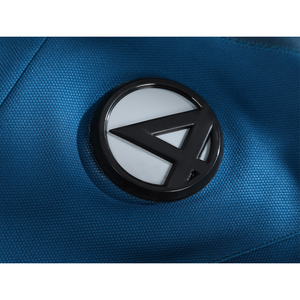 The Fantastic Four cosplay suit emblem badge detail showing iconic number four logo on blue fabric