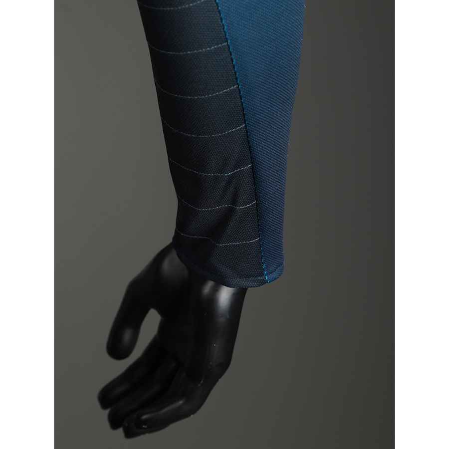 The Fantastic Four cosplay suit sleeve cuff with black glove detail and blue pant fabric closeup