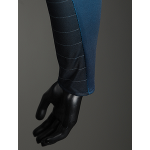 The Fantastic Four cosplay suit sleeve cuff with black glove detail and blue pant fabric closeup