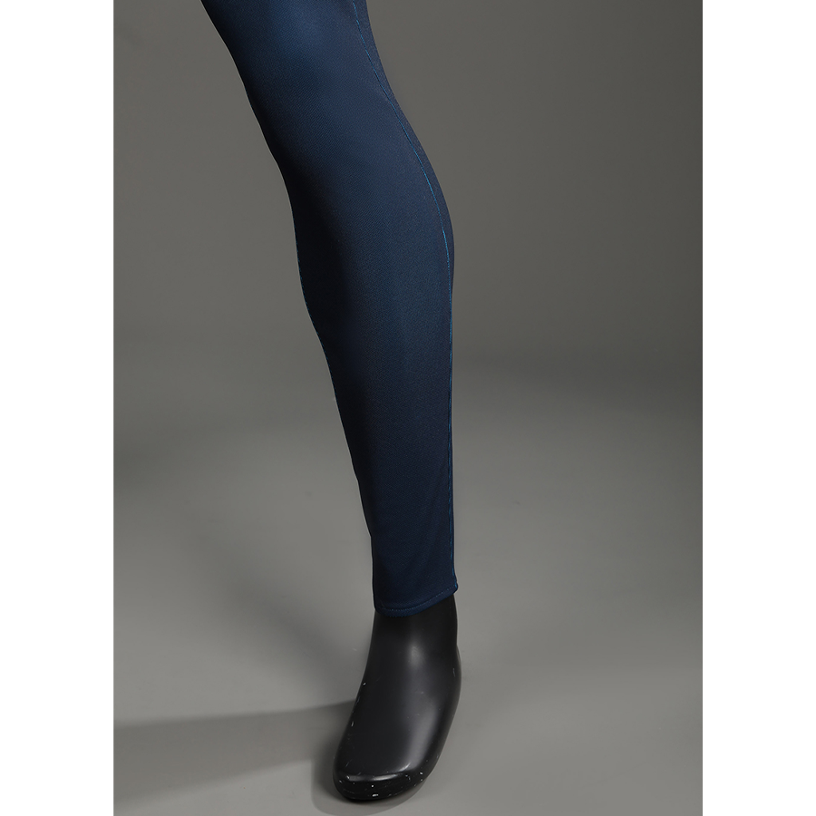 The Fantastic Four cosplay suit pant leg with blue fabric and black boots detail closeup view