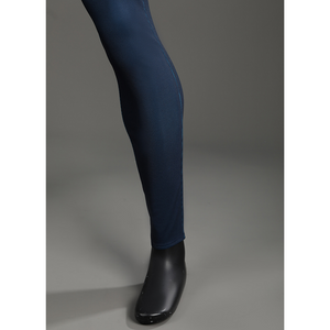 The Fantastic Four cosplay suit pant leg with blue fabric and black boots detail closeup view